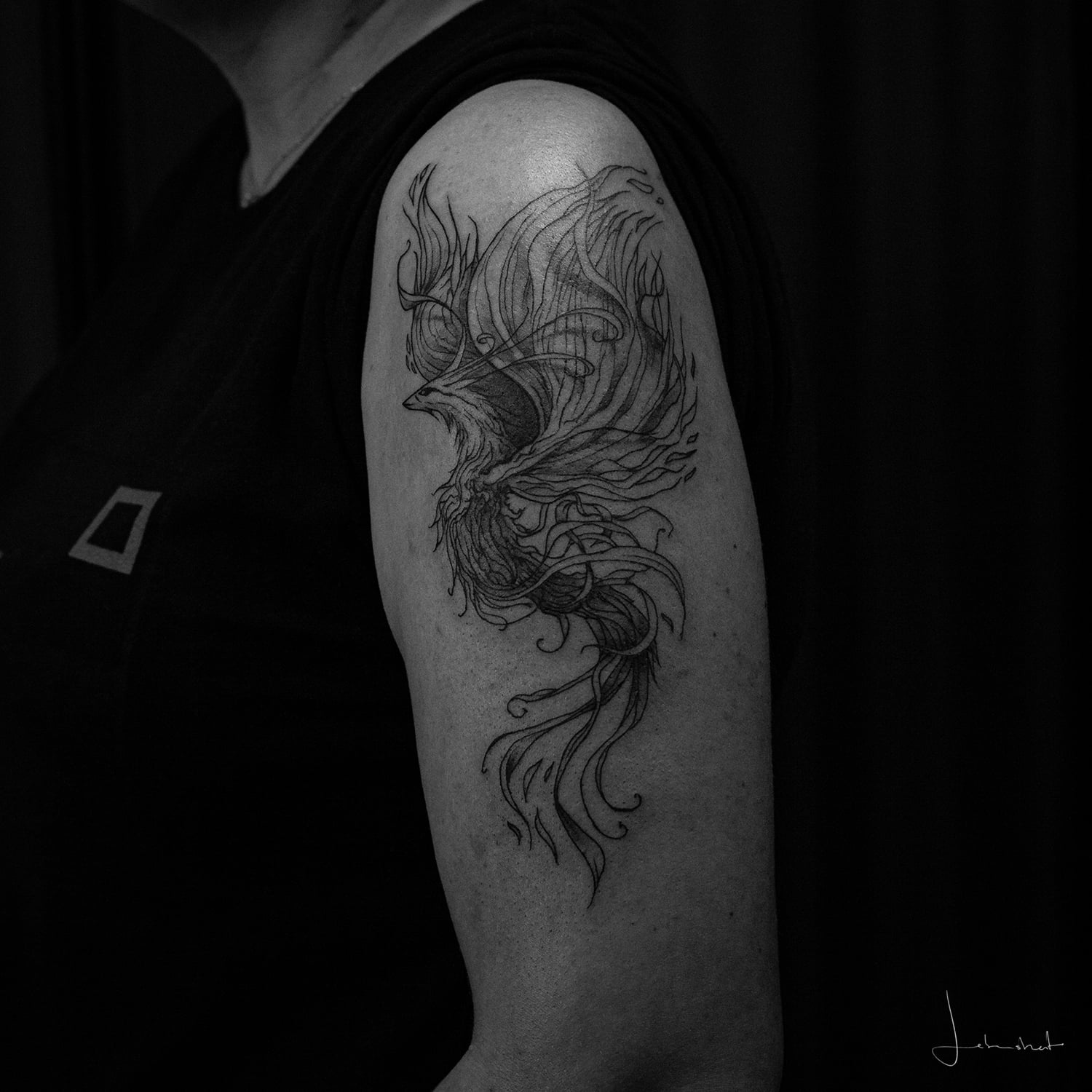 Ein Phoenix auf dem Oberarm