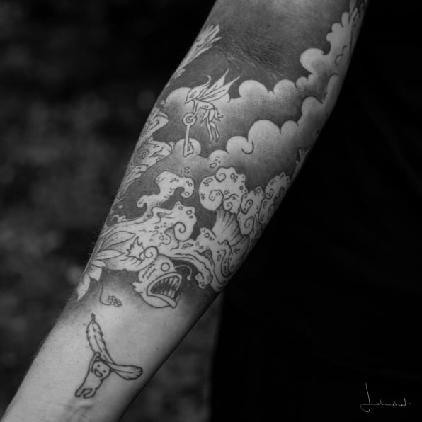 Detail Wolken und Wasser Tattoo